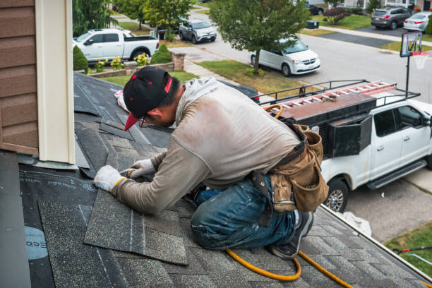 Professional Roof Replacement technician working in Darien, CT